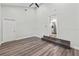 Bedroom boasts ceiling fan and new laminate floors at 5724 Casson Ave, New Port Richey, FL 34652