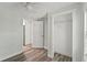 Bedroom offers laminate floors and a closet at 5724 Casson Ave, New Port Richey, FL 34652