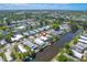 Aerial view of the home's location, situated on a canal with access to open water at 5824 Portsmouth Dr, Tampa, FL 33615