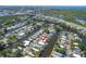Aerial view of the community with water access, close proximity to shopping, and a major highway at 5824 Portsmouth Dr, Tampa, FL 33615