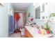 Bathroom with decorative floral shower curtain, single sink vanity, and ample natural light at 5824 Portsmouth Dr, Tampa, FL 33615