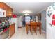 Open kitchen and dining area with abundant cabinet space and natural light at 5824 Portsmouth Dr, Tampa, FL 33615