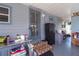 Enclosed patio with storage and work area; great space for hobbies or relaxation at 5824 Portsmouth Dr, Tampa, FL 33615