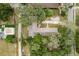 The home features mature trees and a well-maintained yard, as seen in this aerial view at 6019 Wyoming Ave, New Port Richey, FL 34653