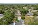 Aerial view shows a detached garage and a well maintained yard with the home at 6019 Wyoming Ave, New Port Richey, FL 34653
