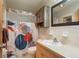 Functional bathroom with a shower, a vanity, and vanity mirror at 6019 Wyoming Ave, New Port Richey, FL 34653
