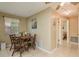 Cozy dining area with view into hall at 6019 Wyoming Ave, New Port Richey, FL 34653