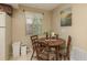 Charming dining area with natural light, great for Gathering meals at 6019 Wyoming Ave, New Port Richey, FL 34653