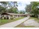 Charming multi-unit property with well-maintained lawns and inviting entryways at 6019 Wyoming Ave, New Port Richey, FL 34653