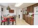 Bright kitchen with adjacent eat-in nook, lots of cabinet space and natural light at 6019 Wyoming Ave, New Port Richey, FL 34653