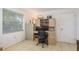 Bright home office featuring built-in desk and storage at 6019 Wyoming Ave, New Port Richey, FL 34653