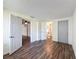 Hallway with views to the bedroom and bathroom at 6341 Hyperion Dr, Port Richey, FL 34668