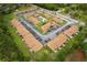 Panoramic aerial view highlights the community's proximity to amenities and roadways at 7122 Barclay Ave # B, Spring Hill, FL 34609