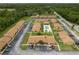Aerial view showcases the layout of the community with a pool and ample parking at 7122 Barclay Ave # B, Spring Hill, FL 34609
