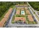 Community aerial view featuring well-maintained buildings and a central pool area at 7122 Barclay Ave # B, Spring Hill, FL 34609