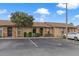 Attractive condo with stone accents, mature trees, and convenient parking space at 7122 Barclay Ave # B, Spring Hill, FL 34609