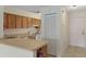Cozy kitchen boasts ample counter space, a stove, and bright white appliances at 7122 Barclay Ave # B, Spring Hill, FL 34609