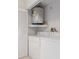 Bright laundry area features a washer, dryer, and water heater for convenience at 7122 Barclay Ave # B, Spring Hill, FL 34609