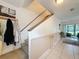 Stairwell and entry hallway with front door view at 7133 Trenton Pl, New Port Richey, FL 34653