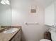 Bathroom featuring granite counter and tile flooring at 7135 Trenton Pl, New Port Richey, FL 34653