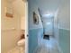 Hallway leading to bathroom with tile floors at 7135 Trenton Pl, New Port Richey, FL 34653