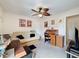 Bedroom with desk, futon, and leaf fan at 7135 Trenton Pl, New Port Richey, FL 34653