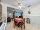 Kitchen with connected dining area and stainless steel appliances at 7135 Trenton Pl, New Port Richey, FL 34653