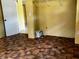 Bedroom featuring tile flooring and doorway to additional rooms at 723 W Bayshore Dr, Tarpon Springs, FL 34689