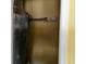 Small interior closet with shelving and contents visible, lit by overhead lighting at 723 W Bayshore Dr, Tarpon Springs, FL 34689