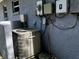 Air conditioning unit with electric box and meter on the exterior of the home at 723 W Bayshore Dr, Tarpon Springs, FL 34689