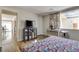 Bedroom featuring a bed and wooden desk area at 7412 Bellows Falls Ln, Hudson, FL 34667