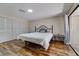 Bedroom featuring a bed and closet at 7412 Bellows Falls Ln, Hudson, FL 34667