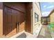 Charming home showcasing a stylish front door, leading to an inviting outdoor lounge at 7412 Bellows Falls Ln, Hudson, FL 34667