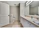 Bathroom features double sinks, toilet, and large vanity space at 7423 Woodhollow Rd, Spring Hill, FL 34606