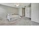 Bright bedroom features neutral paint, ceiling fan, and carpet at 7423 Woodhollow Rd, Spring Hill, FL 34606