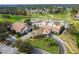 Beautiful aerial view of the Timber Pines clubhouse, showcasing its architecture and surrounding landscape at 7423 Woodhollow Rd, Spring Hill, FL 34606