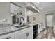 Stylish kitchen with granite countertops, stainless steel sink, and modern faucet at 7423 Woodhollow Rd, Spring Hill, FL 34606