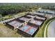 Aerial view of multiple pickleball courts showcasing a vibrant and active community recreation area at 7423 Woodhollow Rd, Spring Hill, FL 34606