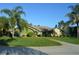 Attractive single-story home with lush green lawn and mature landscaping at 7550 Jomel Dr, Weeki Wachee, FL 34607
