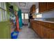 This utility garage area features plenty of extra storage with lots of counter space at 7550 Jomel Dr, Weeki Wachee, FL 34607