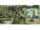 Map showing property lines and the location of nearby houses with landscaping and pools at 7550 Jomel Dr, Weeki Wachee, FL 34607