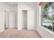 Bedroom featuring carpeting and double door closet at 758 Alpine Thistle Dr, Brooksville, FL 34604