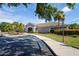 Well-maintained community clubhouse with ample parking and manicured landscaping at 758 Alpine Thistle Dr, Brooksville, FL 34604