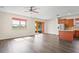 Bright, open-concept living space leading to outdoor patio at 758 Alpine Thistle Dr, Brooksville, FL 34604