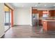 Bright open space featuring sliding glass doors and an eat-in kitchen with island at 758 Alpine Thistle Dr, Brooksville, FL 34604