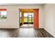 View from inside showing a covered and screened patio overlooking a backyard at 758 Alpine Thistle Dr, Brooksville, FL 34604