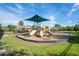 Community playground with slides and swings, perfect for children and families at 758 Alpine Thistle Dr, Brooksville, FL 34604