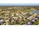 Expansive view of the neighborhood with ponds and green spaces nearby at 8130 Bugle Ct # 3, Port Richey, FL 34668