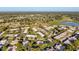 Expansive view of the neighborhood with ponds and green spaces nearby at 8130 Bugle Ct # 3, Port Richey, FL 34668