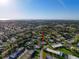 Neighborhood community with streets and trees shown from an aerial view at 8130 Bugle Ct # 3, Port Richey, FL 34668